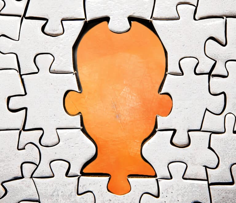 puzzle with a human shape subtracted